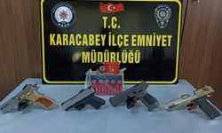 Karacabey'de bir evde ruhsatsız tabancalar ele geçirildi