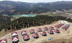 Orman ve baraj manzaralı deprem konutları
