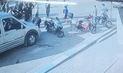 Kapıyı açmasıyla motosiklet sürücüsü yere yığıldı