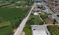 Büyükşehir Yazlık Kavşağı’nın trafik yükünü alacak duble yolda asfalt çalışmasına başladı