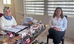 Burhaniye'de İlçe Sağlık Müdürü Akbey, kadın muhtarı ziyaret etti