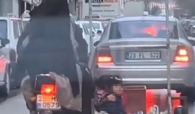 Küçük çocukların tehlikeli motosiklet yolculuğu kamerada