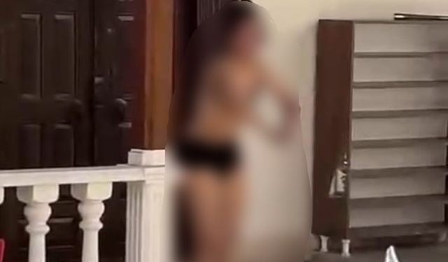 Edremit’te cami önünde kıyafetlerini çıkaran kadın hakkında polis işlem yaptı