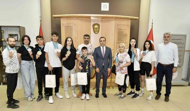 Şampiyon sporculardan Osman Ercan’a ziyaret