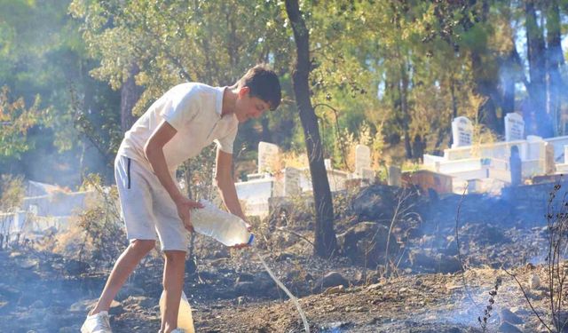 Orman yangınında 12 yaşındaki Eymen’den alkışlanacak hareket