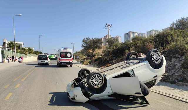 Kuşadası’nda takla atıp, ters dönen otomobildeki sürücü yaralandı