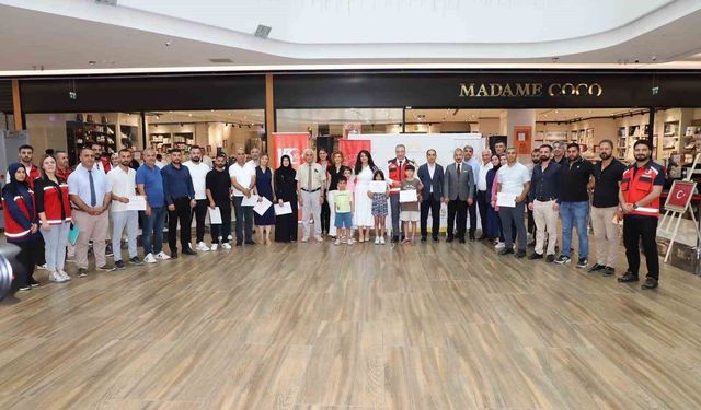 Adıyaman'da şehit yakınları ve gazilerin ebru sergisi açıldı