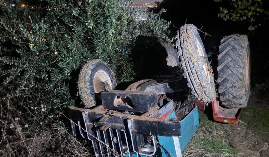 Altınözü'nde ters dönen traktörün altında kalan sürücü yaralandı