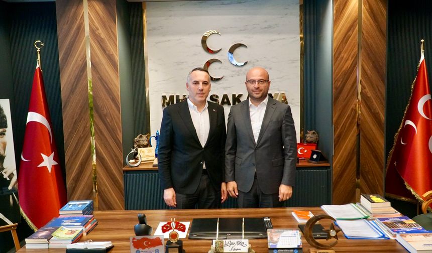 Yunus Tever'den MHP'ye hayırlı olsun ziyareti